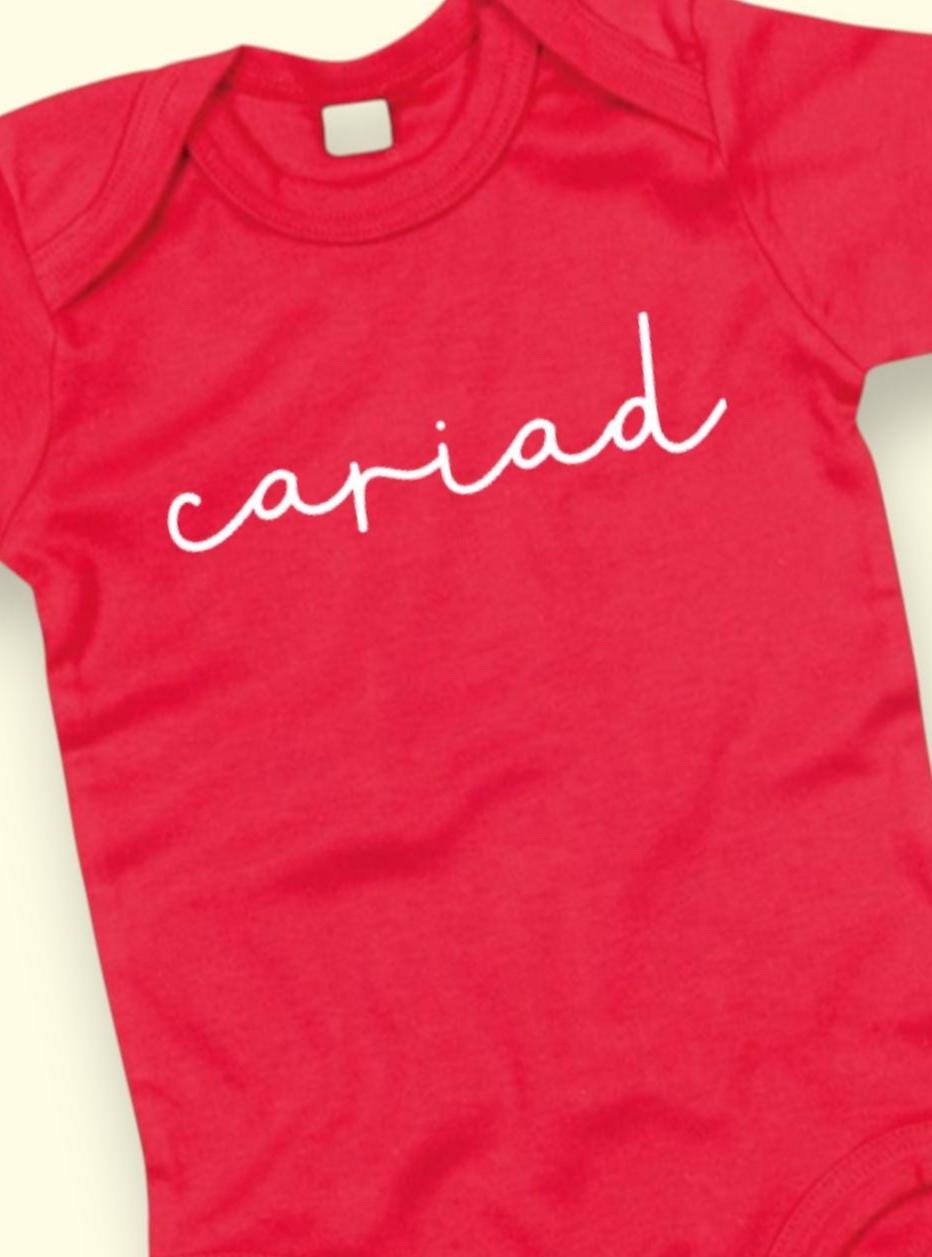 Welsh Baby Onesie – 'Cariad' Red Bodysuit – Personalized Gift for Babies & Kids –  Santes Dwynwen